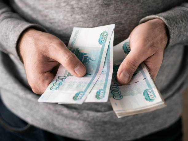 hands counting russian rubles. selective focus. shallow dof